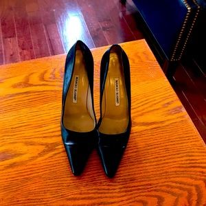 Manila Blahnik black pumps